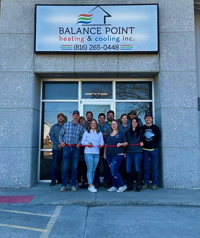 Team Ribbon Cutting Balance Team at their ribbon cutting